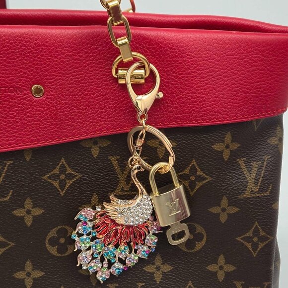 Authentic Louis Vuitton Lock & Key with unbranded Peacock Bagcharm 021026 - Picture 9 of 9